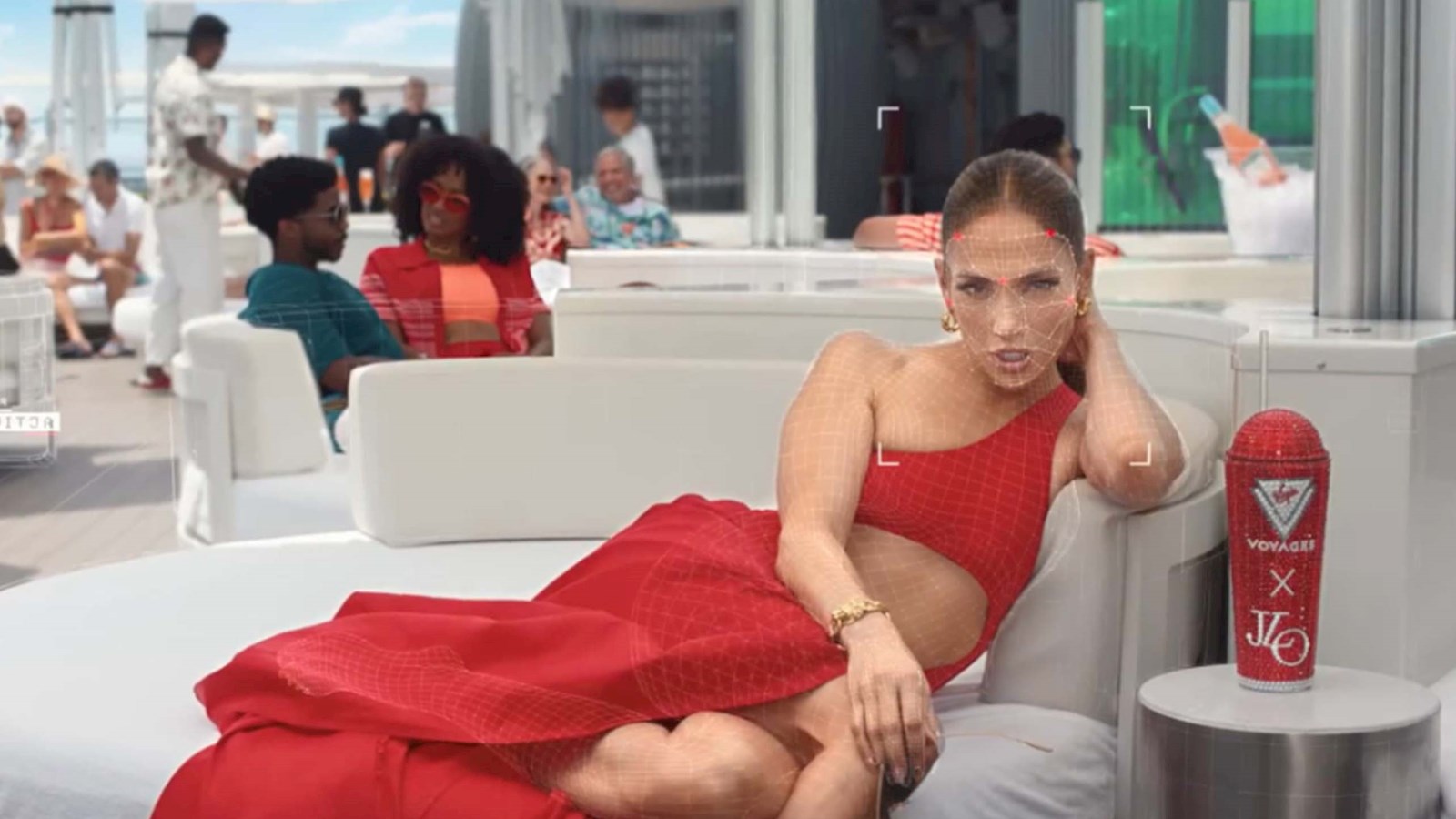 AI image of Jennifer Lopez in a red dress lying on an outdoor couch